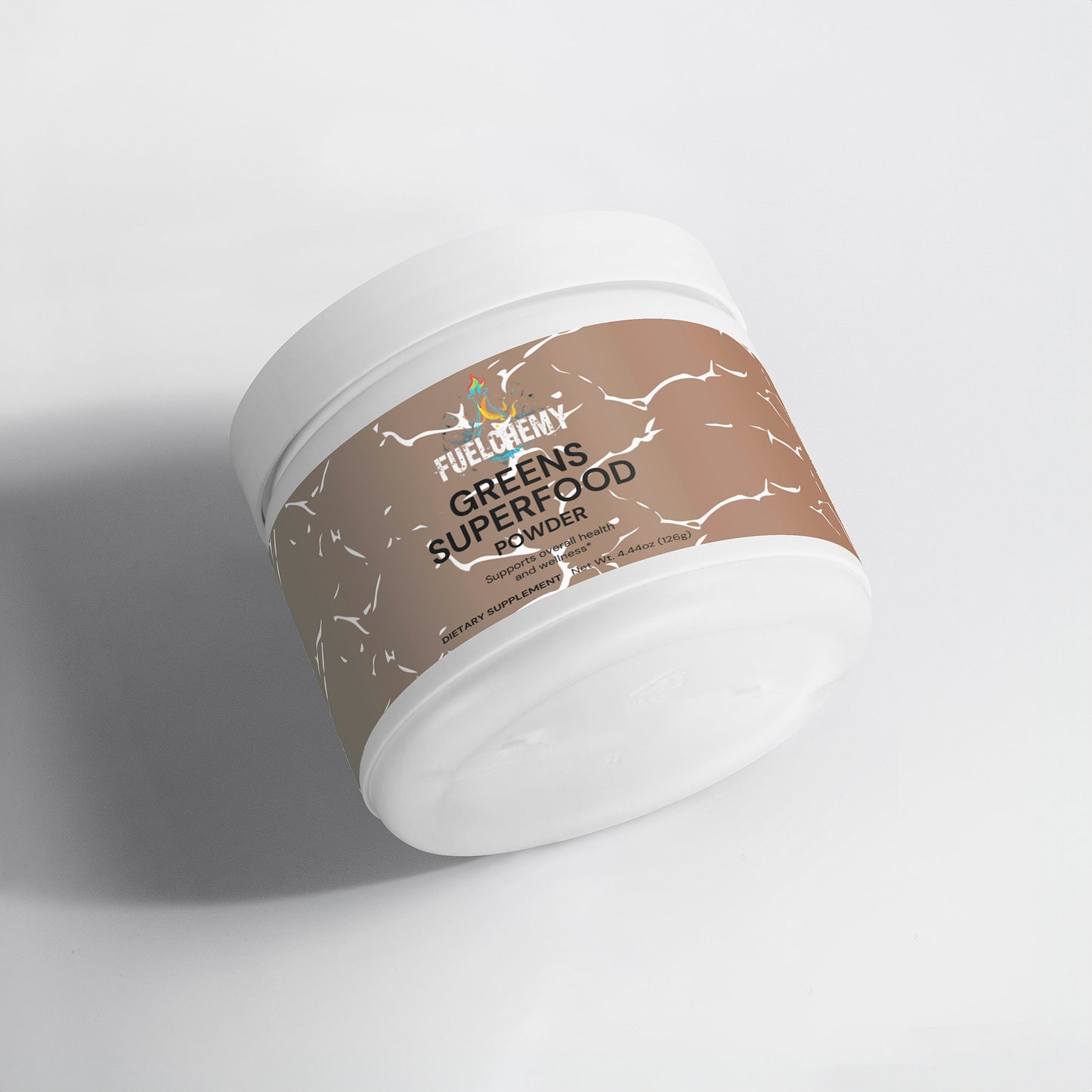 Fuelchemy Greens Superfood Powder for energy in a sealed white container on a light background