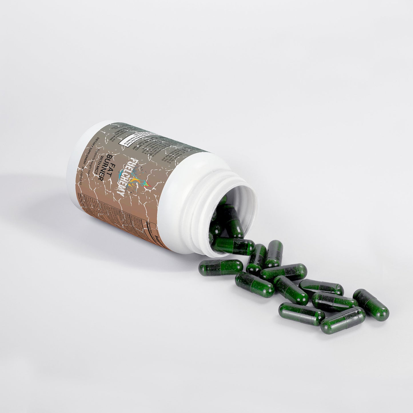 Fuelchemy Fat Burning Capsules in a spilled bottle for effective weight loss support