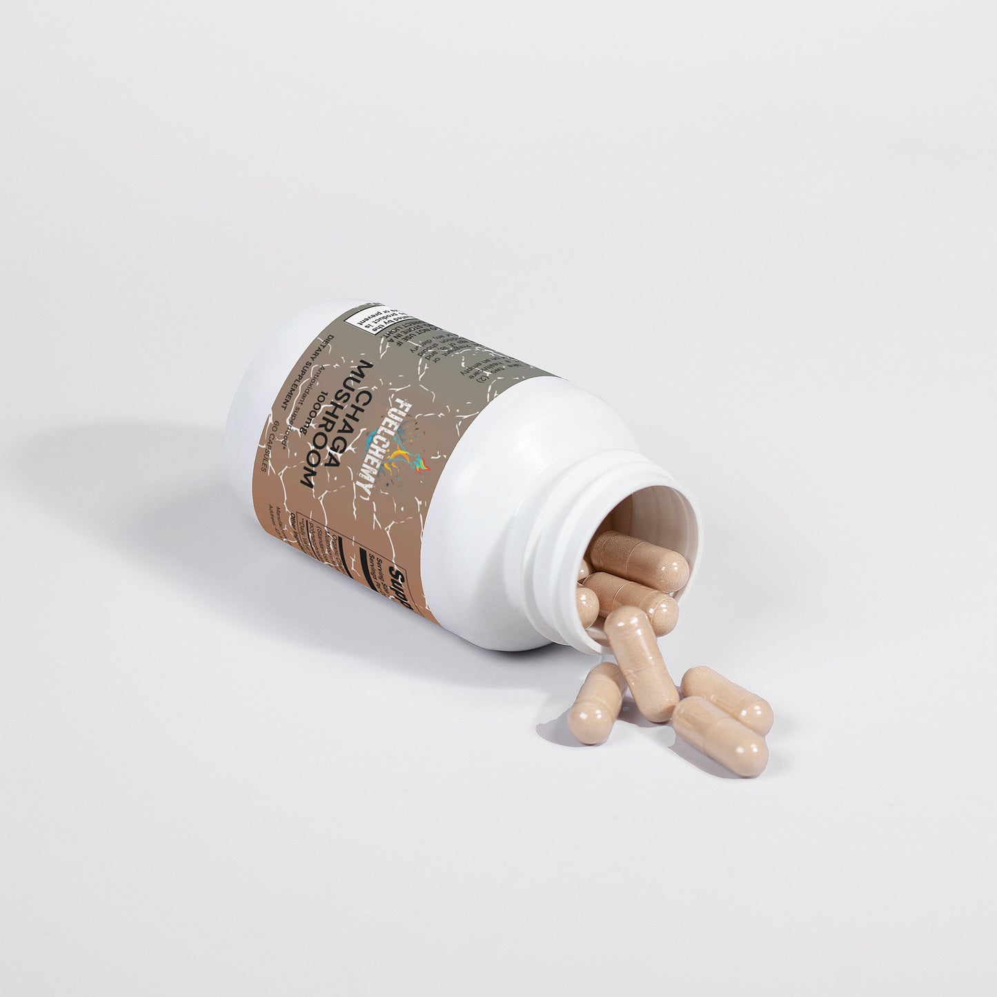 Fuelchemy Chaga mushroom supplement capsules in an open bottle on a white background