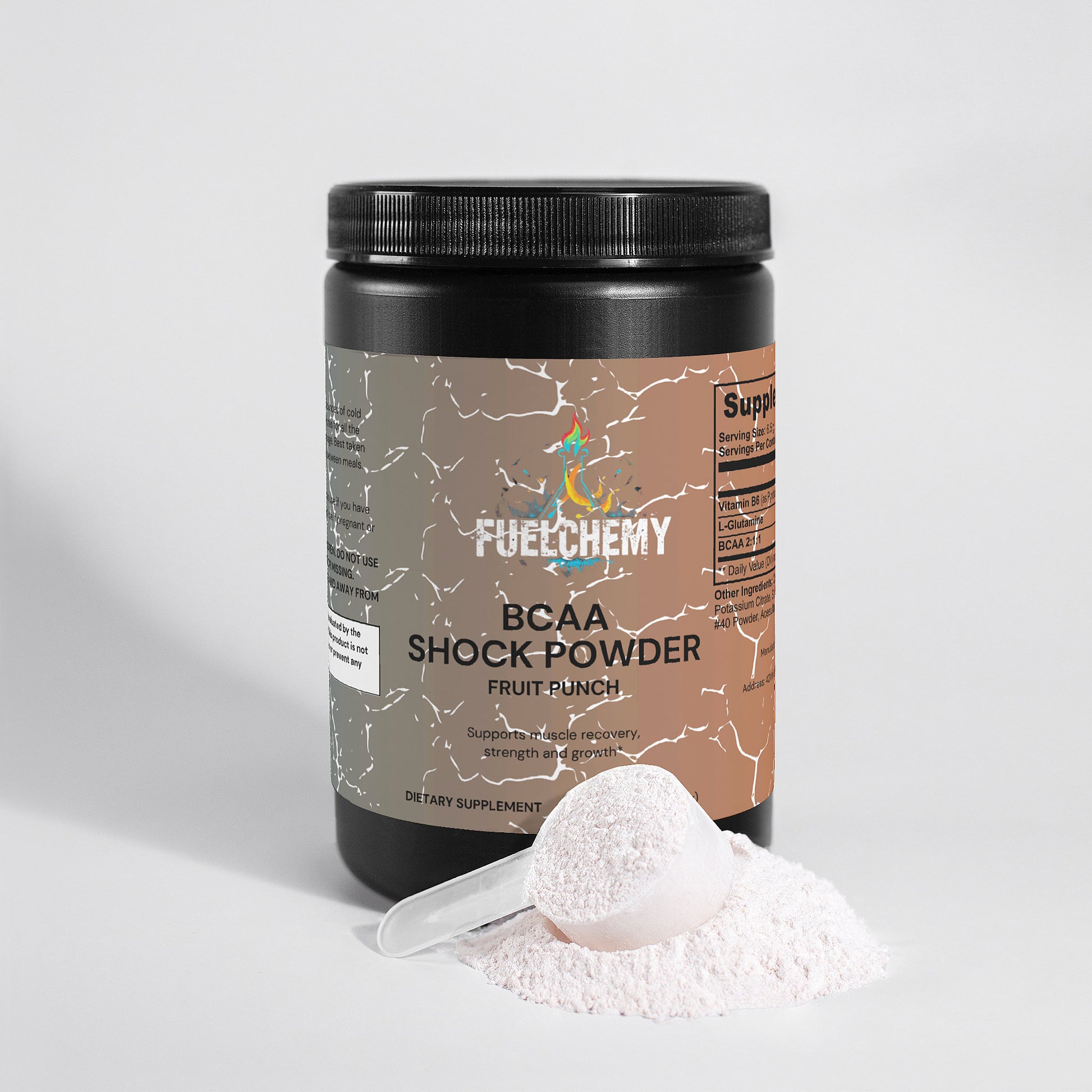 Fuelchemy Fruit Punch BCAA powder in a black container with a scoop and powder spill