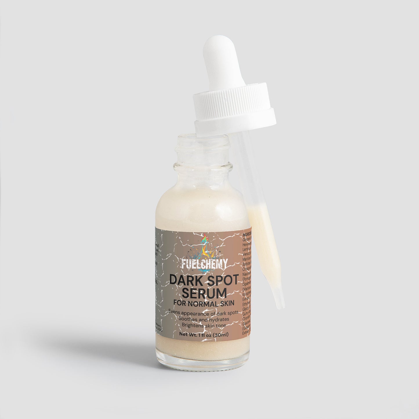 Fuelchemy Dark Spot Serum for Normal Skin in a glass dropper bottle for flawless skin care