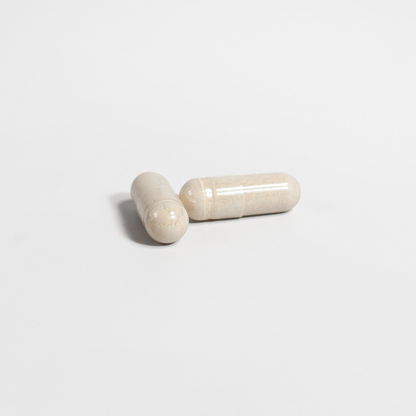 Fuelchemy men's vitality capsules in a light color for enhanced energy and well-being