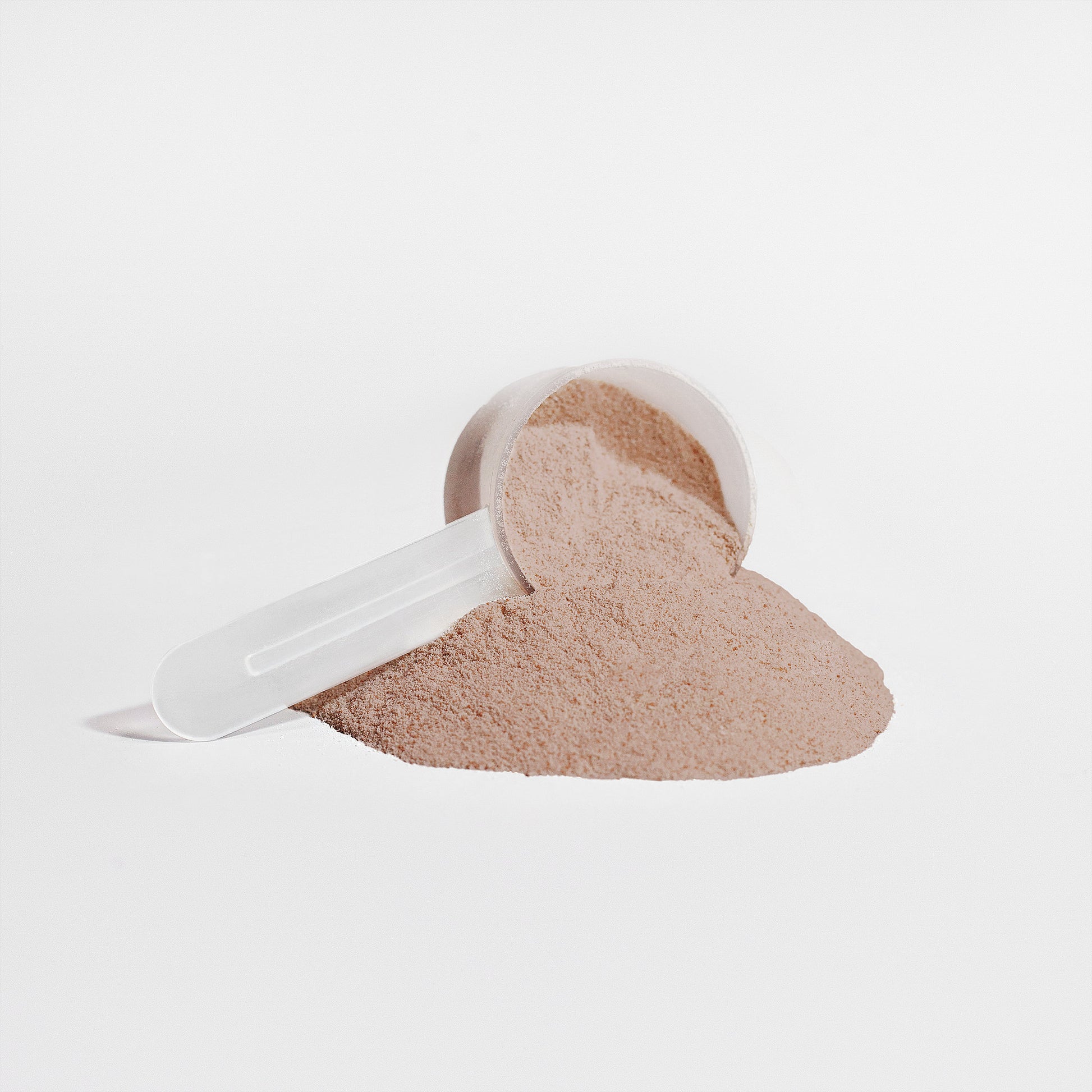 Fuelchemy vegan chocolate protein supplement powder with a scoop for easy measuring