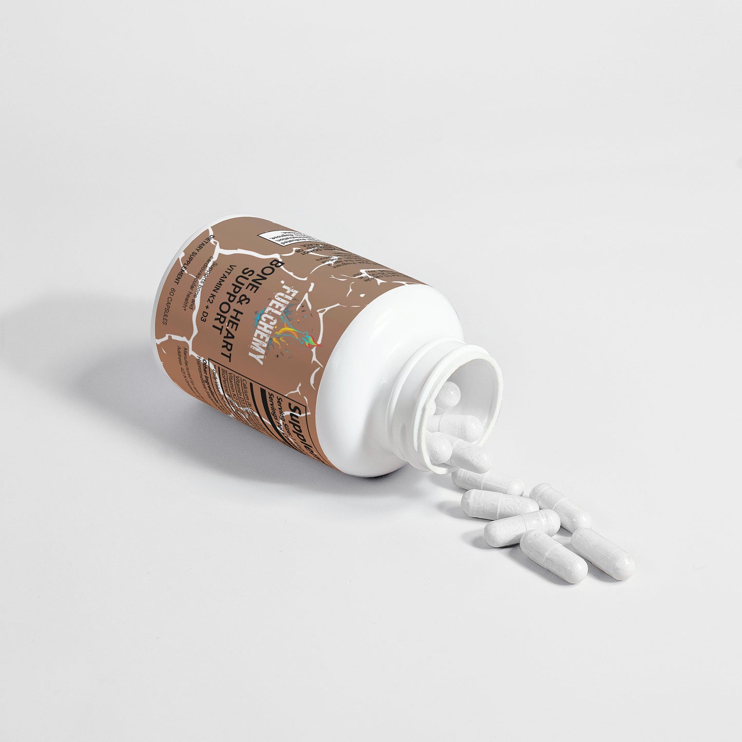 Fuelchemy Vitamin K2 D3 supplement bottle with soft gels spilling out on a light background